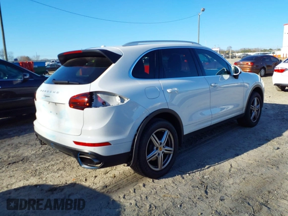 2016 Porsche Cayenne z VIN WP1AA2A2XGKA09945, wystawiony jako IAAI lot #41645654 z przebiegiem 79 327 mil mil oraz . Historia ofert i sprzedaży dostępna na DreamBid. Obrazek 4.