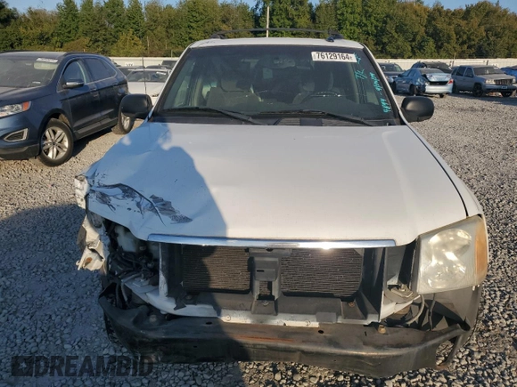 2004 GMC Envoy SLE with VIN 1GKDS13S542233286, listed as a Copart auction lot 76129164 with 228,981 mi miles and Salvage Title. Bid and sale history available at DreamBid. Image 5.