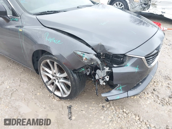 2015 Mazda 6 i Grand Touring with VIN JM1GJ1W56F1207077, listed as a IAAI auction lot 41734641 with 109,447 mi miles and . Bid and sale history available at DreamBid. Image 17.