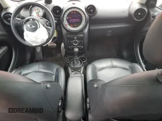 2014 MINI Countryman S z VIN WMWZC5C53EWP37312, wystawiony jako Copart lot #57952885 z przebiegiem 115 708 mil mil oraz Szkoda całkowita • Salvage title. Historia ofert i sprzedaży dostępna na DreamBid. Obrazek 8.