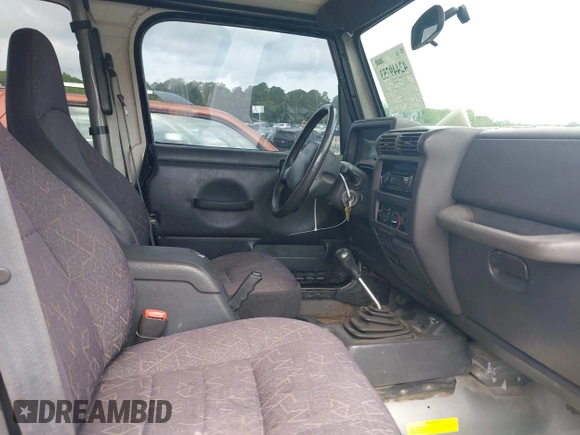 2002 Jeep Wrangler Sport with VIN 1J4FA49S52P717811, listed as a IAAI auction lot 42449753 with 252,258 mi miles and . Bid and sale history available at DreamBid. Image 5.