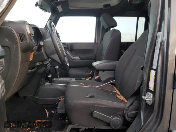 2018 Jeep Wrangler JK Unlimited Sport S with VIN 1C4BJWDG7JL814744, listed as a Copart auction lot 77830714 with 130,229 mi miles and Salvage Title. Bid and sale history available at carsss.com. Image 7.