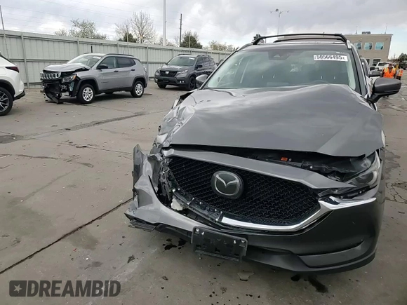 2017 Mazda CX-5 Grand Touring with VIN JM3KFBDL4H0163339, listed as a Copart auction lot 50566495 with 83,453 mi miles and Salvage Title. Bid and sale history available at carsss.com. Image 14.