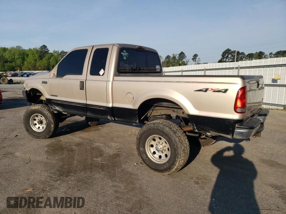 1999 Ford F-250 XL with VIN 1FTNX21F0XEE70963, listed as a Copart auction lot 52294955 with 218,969 mi miles and Salvage title. Bid and sale history available at DreamBid. Image 2.