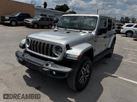 2024 Jeep Wrangler Sahara z VIN 1C4PJXEN6RW171855, wystawiony jako Copart lot #58272205 z przebiegiem 15 589 mil mil oraz Czysty tytuł • Clean title. Historia ofert i sprzedaży dostępna na DreamBid. Obrazek 2.