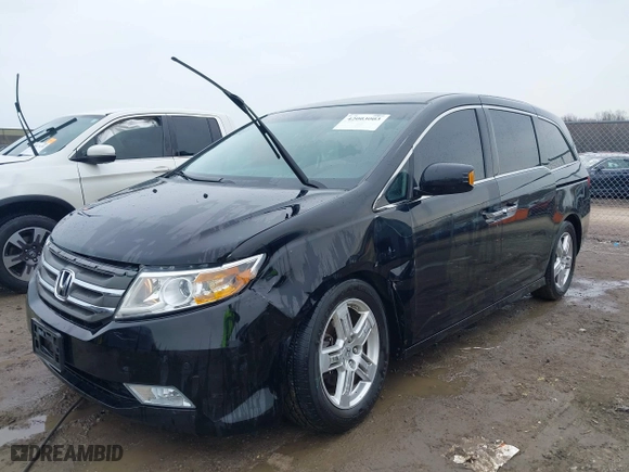 2012 Honda Odyssey Touring with VIN 5FNRL5H92CB118720, listed as a IAAI auction lot 42003003 with 93,284 mi miles. Bid and sale history available at carsss.com. Image 17.