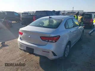 2023 Kia Rio S z VIN 3KPA24AD2PE545609, wystawiony jako IAAI lot #41993823 z przebiegiem 12 186 mil mil oraz . Historia ofert i sprzedaży dostępna na DreamBid. Obrazek 4.