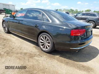 2011 Audi A8 with VIN WAURVAFD6BN005425, listed as a IAAI auction lot 42623409 with 264,365 mi miles and . Bid and sale history available at DreamBid. Image 3.