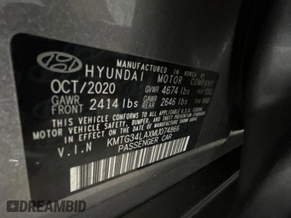 2021 Genesis G70 2.0T z VIN KMTG34LAXMU074866, wystawiony jako Copart lot #56966995 z przebiegiem 54 000 mil mil oraz Czysty tytuł • Clean title. Historia ofert i sprzedaży dostępna na DreamBid. Obrazek 10.