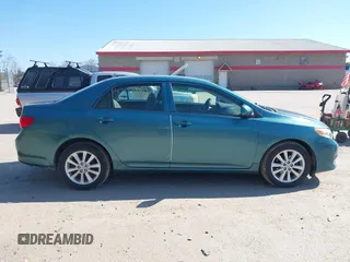 2009 Toyota Corolla with VIN JTDBL40E299037014, listed as a IAAI auction lot 42078954 with 86,559 mi miles. Bid and sale history available at carsss.com. Image 14.