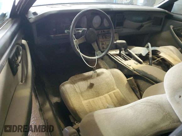 1987 Pontiac Firebird with VIN 1G2FS21S4HN213083, listed as a Copart auction lot 69101254 with 172,214 mi miles and Salvage title. Bid and sale history available at DreamBid. Image 8.