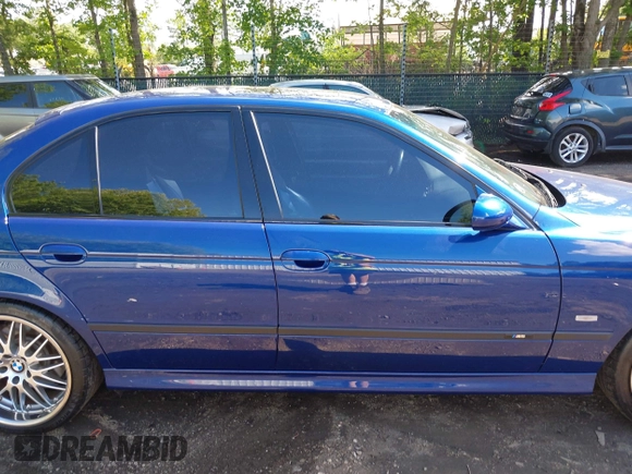 2002 BMW M5 z VIN WBSDE93452BZ99916, wystawiony jako IAAI lot #42346645 z przebiegiem 90 876 mil mil oraz . Historia ofert i sprzedaży dostępna na DreamBid. Obrazek 13.