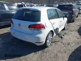 2013 Volkswagen Golf TDI with VIN WVWDM7AJ0DW132068, listed as a IAAI auction lot 41683723 with 124,310 mi miles and . Bid and sale history available at DreamBid. Image 4.