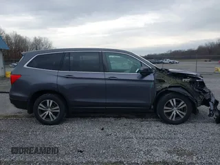 2017 Honda Pilot EX-L with VIN 5FNYF6H59HB029160, listed as a IAAI auction lot 41557192 with 157,153 mi miles and . Bid and sale history available at DreamBid. Image 14.