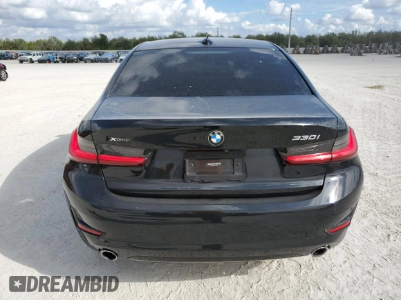 2021 BMW 3 Series 330i xDrive with VIN WBA5R7C08MFJ94101, listed as a Copart auction lot 86703334 with 51,533 mi miles and Salvage Title. Bid and sale history available at carsss.com. Image 6.