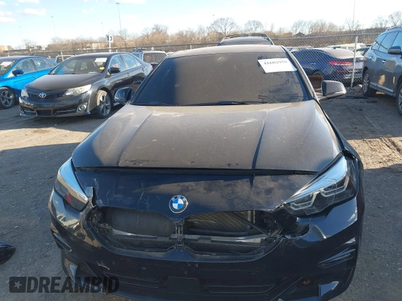 2021 BMW 2 Series 228i xDrive with VIN WBA73AK03M7H66827, listed as a IAAI auction lot 41682959 with 57,875 mi miles and . Bid and sale history available at DreamBid. Image 12.