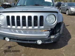 2014 Jeep Patriot Sport z VIN 1C4NJRBB5ED815798, wystawiony jako IAAI lot #41795546 z przebiegiem 106 875 mil mil oraz . Historia ofert i sprzedaży dostępna na DreamBid. Obrazek 6.
