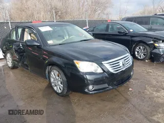 2010 Toyota Avalon XL with VIN 4T1BK3DBXAU357773, listed as a IAAI auction lot 41228045 with 127,403 mi miles and . Bid and sale history available at carsss.com. Image 1.