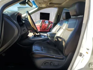 2016 Infiniti QX60 with VIN 5N1AL0MM9GC511705, listed as a Copart auction lot 87433274 with 129,269 mi miles and Salvage Title. Bid and sale history available at DreamBid. Image 7.