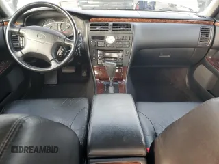 1999 Infiniti Q45 z VIN JNKBY31A3XM602869, wystawiony jako Copart lot #78799354 z przebiegiem 189 083 mil mil oraz Szkoda całkowita • Salvage title. Historia ofert i sprzedaży dostępna na DreamBid. Obrazek 8.
