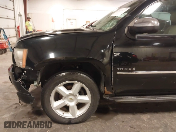 2012 Chevrolet Tahoe LTZ with VIN 1GNSKCE02CR297261, listed as a IAAI auction lot 40255137 with 283,110 mi miles and . Bid and sale history available at DreamBid. Image 19.