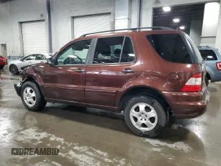 2002 Mercedes-Benz M-Class with VIN 4JGAB75E72A323840, listed as a Copart auction lot 75729384 with 122,811 mi miles and Salvage Title. Bid and sale history available at carsss.com. Image 2.