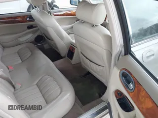 1999 Jaguar XJ with VIN SAJHX1043XC856474, listed as a IAAI auction lot 41626649 with 103,266 mi miles and . Bid and sale history available at DreamBid. Image 8.