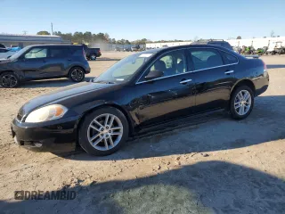 2014 Chevrolet Impala LTZ with VIN 2G1WC5E34E1121605, listed as a Copart auction lot 82705244 with 174,886 mi miles and Salvage Title. Bid and sale history available at DreamBid. Image 1.