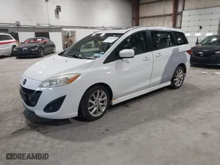 2012 Mazda Mazda5 Grand Touring with VIN JM1CW2DL9C0100114, listed as a IAAI auction lot 42038998 with 160,651 mi miles. Bid and sale history available at carsss.com. Image 2.