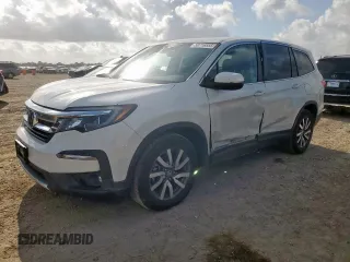 2020 Honda Pilot EX-L with VIN 5FNYF5H50LB024657, listed as a Copart auction lot 59716555 with 44,700 mi miles and Salvage title. Bid and sale history available at DreamBid. Image 1.