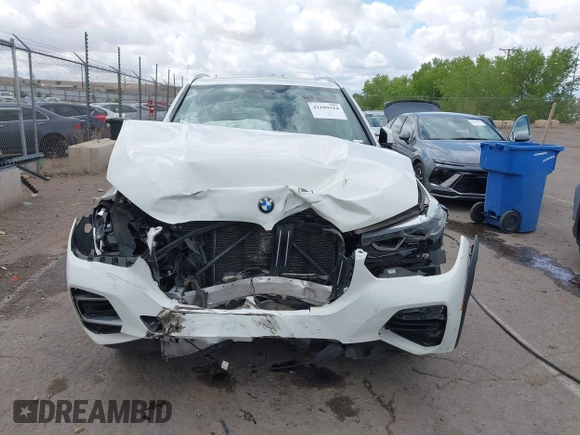 2019 BMW X5 xDrive40i z VIN 5UXCR6C54KLL63804, wystawiony jako IAAI lot #42189314 z przebiegiem Nie podano mil oraz . Historia ofert i sprzedaży dostępna na DreamBid. Obrazek 11.