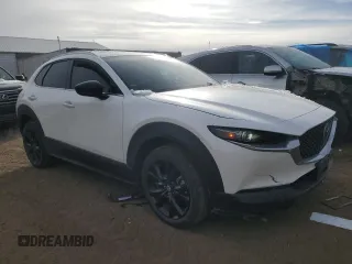 2021 Mazda CX-30 Premium with VIN 3MVDMBDY4MM308677, listed as a Copart auction lot 81869044 with 32,362 mi miles and Salvage Title. Bid and sale history available at carsss.com. Image 4.