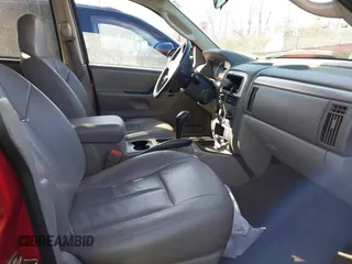 2003 Jeep Grand Cherokee Laredo with VIN 1J4GX48S13C594893, listed as a IAAI auction lot 41688597 with 179,680 mi miles. Bid and sale history available at carsss.com. Image 5.