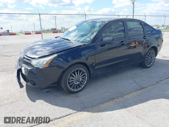 2010 Ford Focus SES with VIN 1FAHP3GN7AW291389, listed as a IAAI auction lot 42003153 with 151,987 mi miles. Bid and sale history available at carsss.com. Image 2.