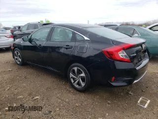 2019 Honda Civic LX with VIN 19XFC2F6XKE004169, listed as a Copart auction lot 83847414 with 65,517 mi miles and Salvage Title. Bid and sale history available at DreamBid. Image 2.