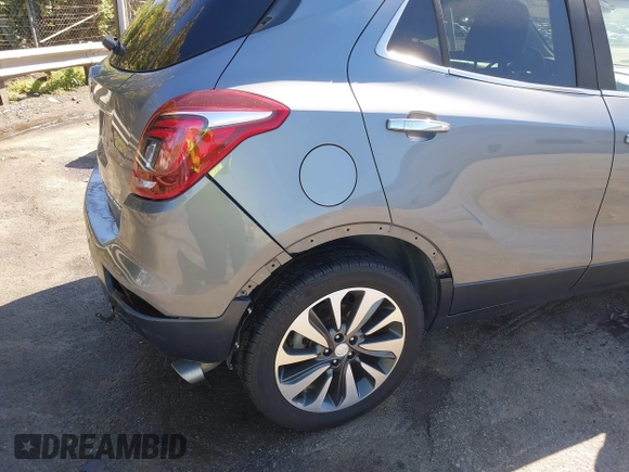 2019 Buick Encore Essence with VIN KL4CJGSM5KB869925, listed as a IAAI auction lot 41937487 with 105,702 mi miles. Bid and sale history available at carsss.com. Image 19.