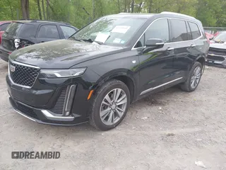 2022 Cadillac XT6 Premium Luxury with VIN 1GYKPDRS5NZ149971, listed as a IAAI auction lot 42259140 with 51,704 mi miles and . Bid and sale history available at DreamBid. Image 2.
