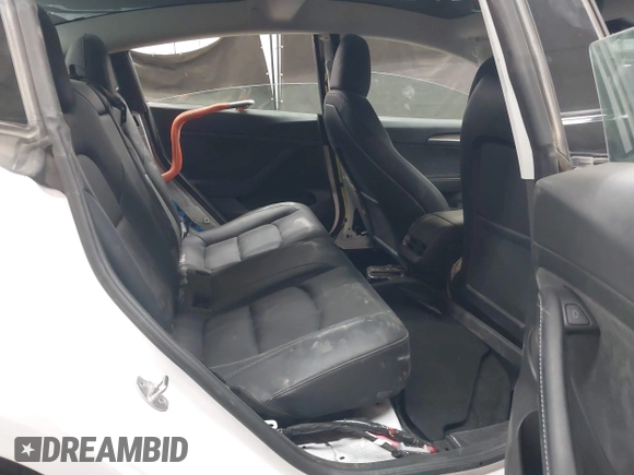 2023 Tesla Model 3 Long Range with VIN 5YJ3E1EB3PF603955, listed as a IAAI auction lot 41915541 with 33,691 mi miles and . Bid and sale history available at DreamBid. Image 8.