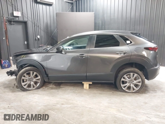 2021 Mazda CX-30 Preferred with VIN 3MVDMBCL1MM247701, listed as a IAAI auction lot 42299009 with 15,880 mi miles and . Bid and sale history available at DreamBid. Image 15.