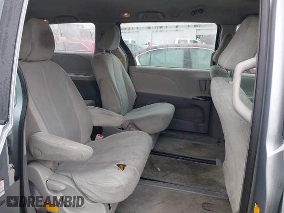 2012 Toyota Sienna with VIN 5TDZK3DC2CS221981, listed as a IAAI auction lot 41650273 with 146,652 mi miles. Bid and sale history available at carsss.com. Image 8.