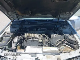 1994 Ford Taurus GL z VIN 1FALP52U2RG186625, wystawiony jako IAAI lot #42381964 z przebiegiem 54 020 mil mil oraz . Historia ofert i sprzedaży dostępna na DreamBid. Obrazek 10.