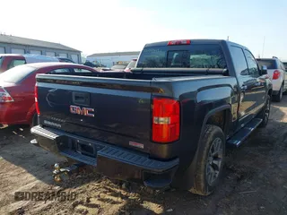 2015 GMC Sierra 1500 SLT with VIN 3GTU2VEC4FG428881, listed as a IAAI auction lot 41779451 with 150,115 mi miles and . Bid and sale history available at DreamBid. Image 4.