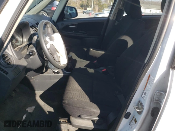 2012 Suzuki SX4 Crossover with VIN JS2YB5A32C6303887, listed as a Copart auction lot 82214144 with 0 mi miles and Salvage Title. Bid and sale history available at carsss.com. Image 7.