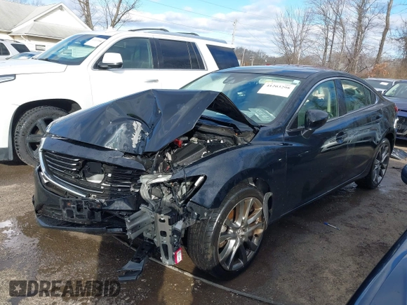 2016 Mazda 6 i Grand Touring with VIN JM1GJ1W54G1454115, listed as a IAAI auction lot 41203298 with 104,632 mi miles and . Bid and sale history available at DreamBid. Image 18.