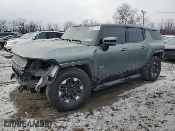 2024 GMC Hummer EV 3X z VIN 1GKB0RDC6RU101989, wystawiony jako Copart lot #85671314 z przebiegiem 7434 mil mil oraz Szkody całkowita. Historia ofert i sprzedaży dostępna na DreamBid. Obrazek 1.