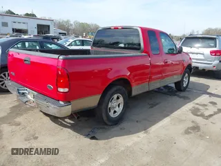 2003 Ford F-150 XL with VIN 1FTRX17W93NB27257, listed as a IAAI auction lot 41835994 with 216,905 mi miles. Bid and sale history available at carsss.com. Image 4.