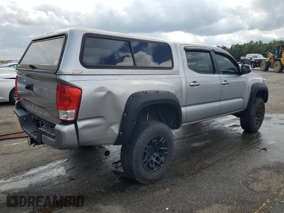 2016 Toyota Tacoma SR5 with VIN 5TFAX5GN3GX073301, listed as a Copart auction lot 71953054 with 148,396 mi miles and Salvage Title. Bid and sale history available at carsss.com. Image 3.