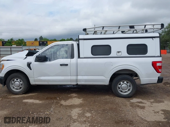 2021 Ford F-150 XL with VIN 1FTMF1CB4MKD85219, listed as a IAAI auction lot 42034028 with 115,415 mi miles and . Bid and sale history available at DreamBid. Image 14.