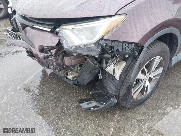 2018 Toyota RAV4 XLE with VIN 2T3WFREV3JW471932, listed as a IAAI auction lot 41491431 with 50,715 mi miles. Bid and sale history available at carsss.com. Image 6.