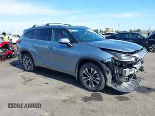 2021 Toyota Highlander XLE with VIN 5TDHZRBH2MS124631, listed as a IAAI auction lot 42660410 with 84,306 mi miles and . Bid and sale history available at DreamBid. Image 1.